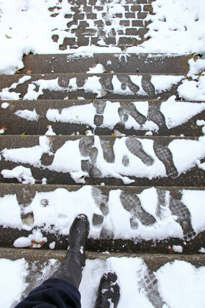 istock Dangerous snow smoothness on walkways and stairs 641918654
