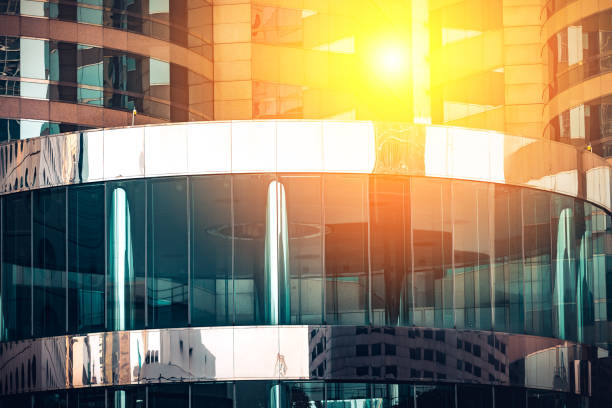istock Modern commercial building with sun ray reflection in window 641919226