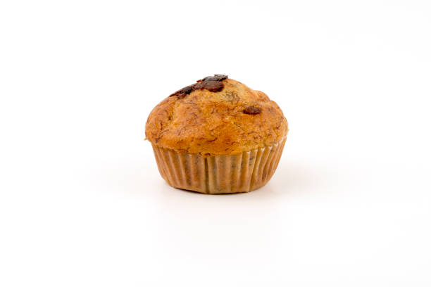 istock muffin cup cake closeup isolated on white background. 641921072