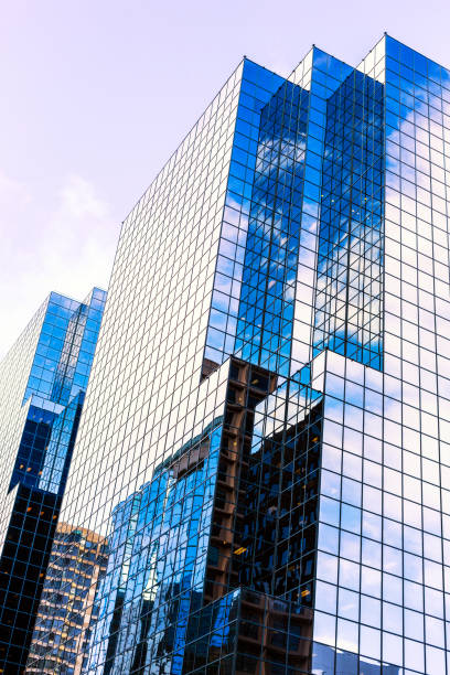 istock Corporate Office Building Reflections In Bright Sunshine Skyscraper Windows 641922776