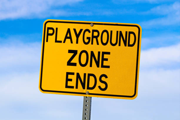 istock Playground Zone End Sign Against Blue Cloudy Sky 641925376