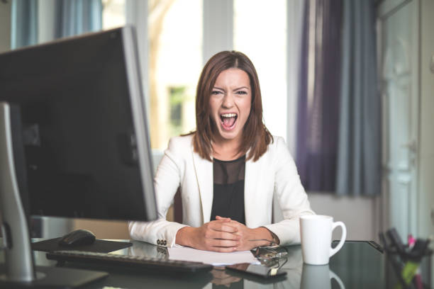istock Angry businesswoman shouting 641925428