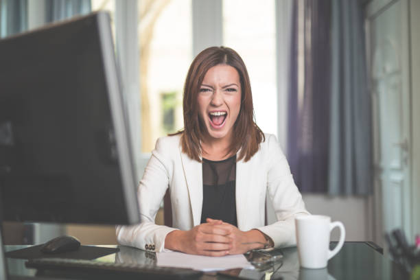 istock Angry businesswoman shouting 641925436
