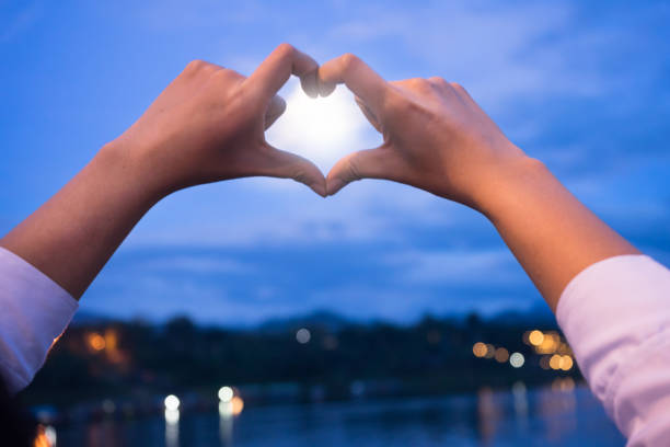 istock Hands in shape of love heart 641926714