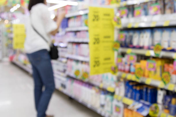 istock Blurred image of a woman with a shopping. 641929168