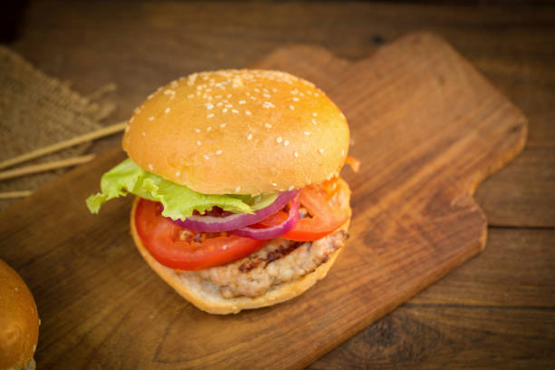 istock Cheese burger with grilled meat, cheese, tomato 641932024