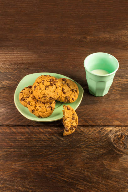 istock Chocolate chips cookies with glass of milk and copyspace 641932616