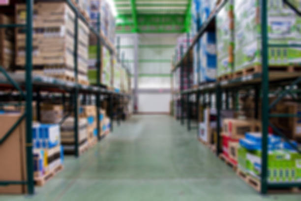 istock keep of warehouse. Rows of shelves with boxes (Blur Picture) 641932668