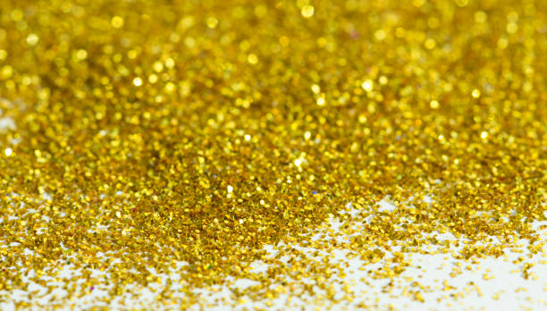 istock Blur golden background from gold tinsels with bokeh 641934830