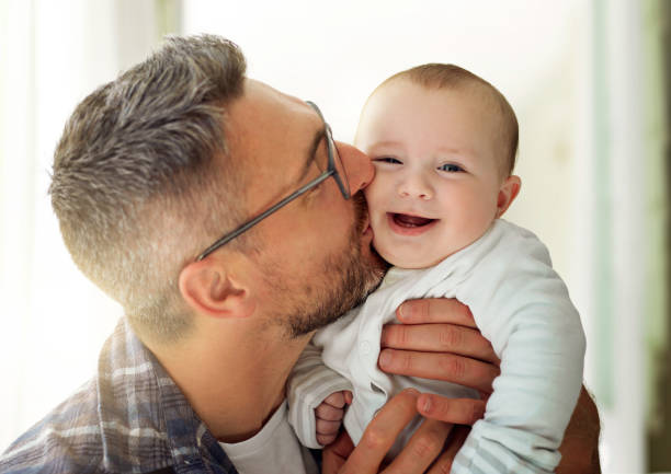 istock I think Dad’s won over by my cuteness 641946548