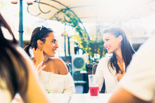 istock Two young girls talking during lunch break 641952768