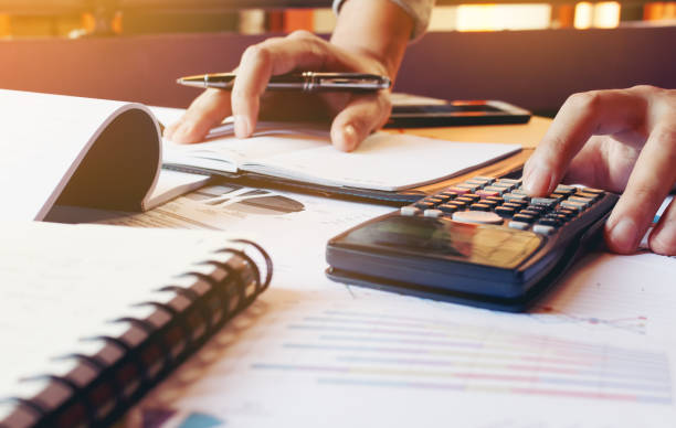 istock Young man calculate finance about expenses in home office. 641953586