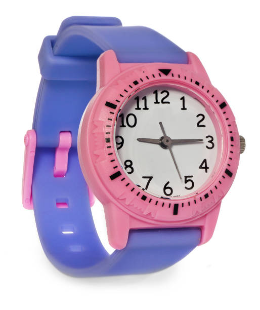 istock Pink watch with a purple stripe. Wristwatch on a white background with slight reflection. 641958976