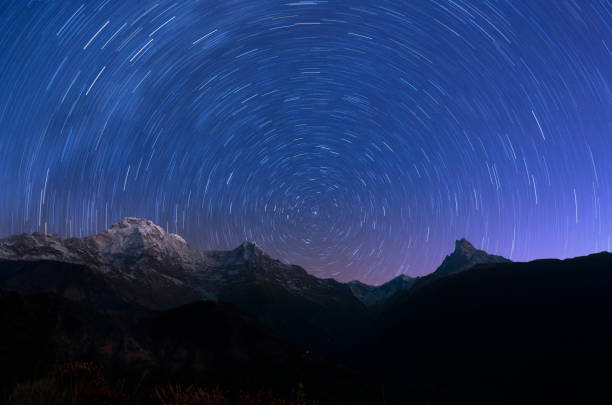 Circling stars and mountain