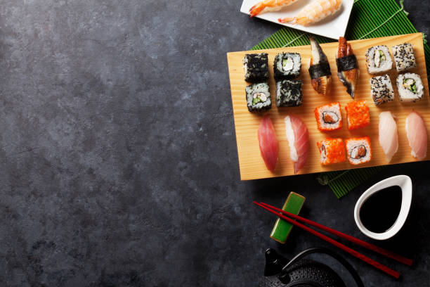 istock Set of sushi, maki and green tea 641963792
