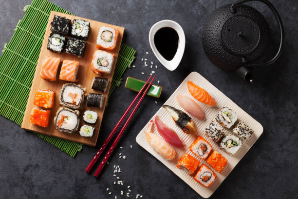 istock Set of sushi, maki and green tea 641964150