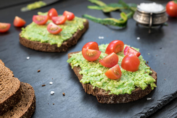 istock Toast with avocado, cherry tomatoes and spices 641964638