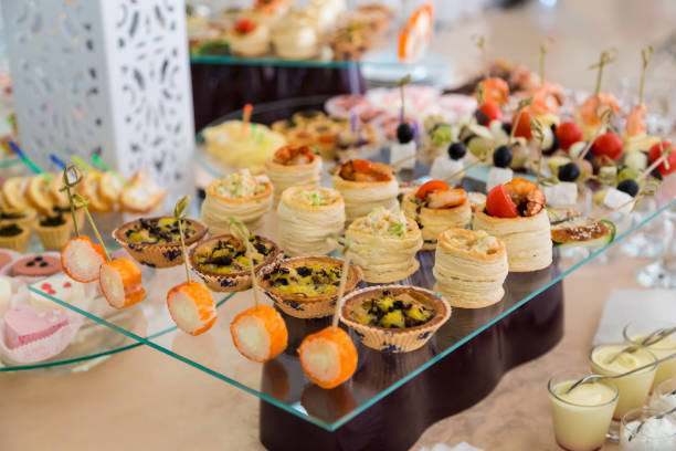 istock Delicacies, appetizers, desserts and beverages for the buffet. 641964702