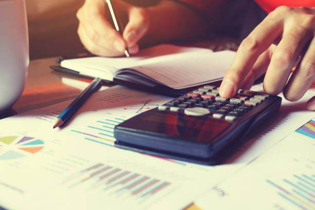 istock Man doing finance and calculate on desk about cost 641965352