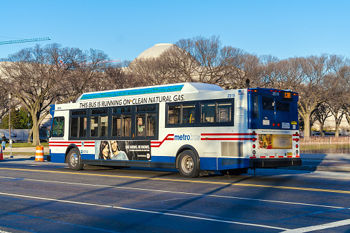 WASHINGTON DC, USA - JANUARY 27, 2006: Public transportation - city metro bus with advertising printed on the side