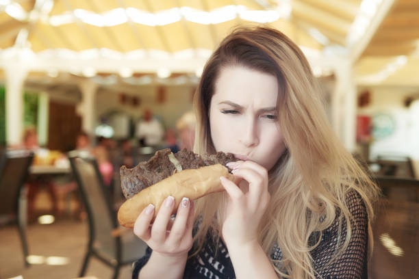 istock eating my sandwich at lunch 641968526