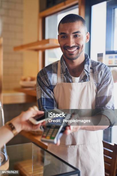 Settle Your Bill The Smart Way Stock Photo - Download Image Now - Paying, Mobile Phone, Near Field Communication