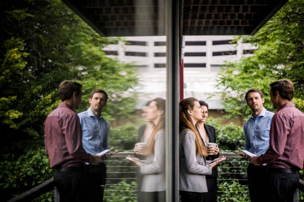 Business people planning strategy on balcony