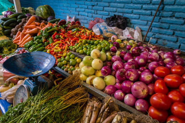 istock Fresh vegetables on market with old scale 641973726