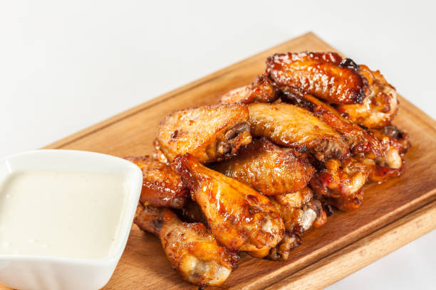 istock Fried chicken legs with sauce 641975354
