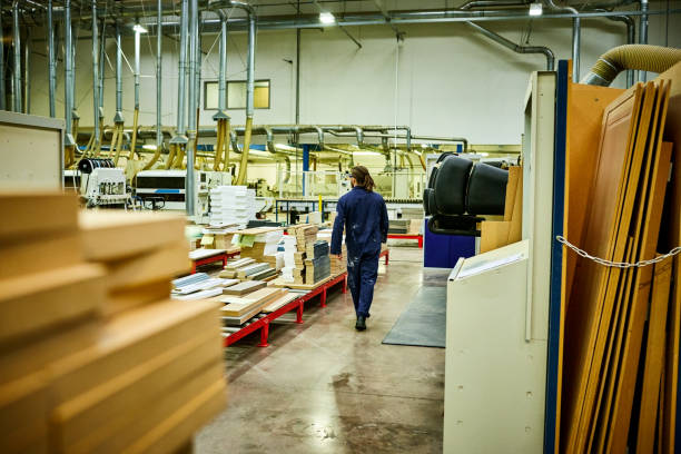istock Manual worker walking in factory 641975544