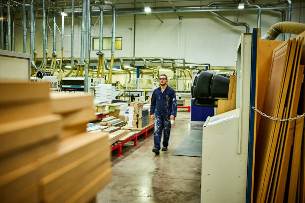 istock Worker walking in factory shop floor 641975548