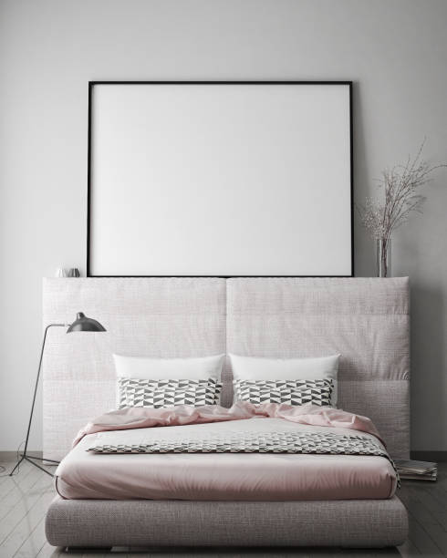 istock mock up poster frame in hipster bedroom interior background, scandinavian style, 3D render 641978288