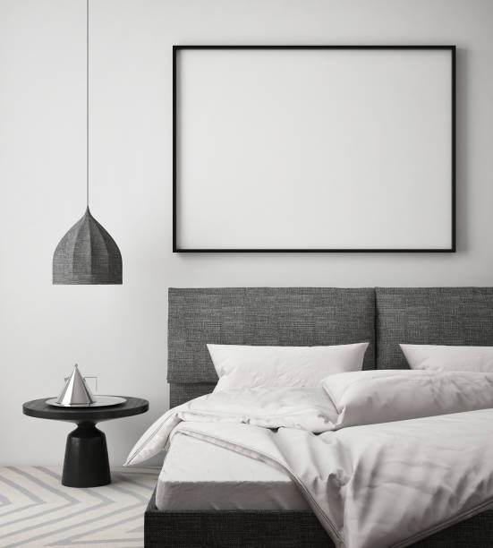 istock mock up poster frame in hipster bedroom interior background, scandinavian style, 3D render 641979376