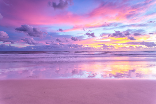 Sunrise Reflections Over The Beach Stock Photo - Download Image ...