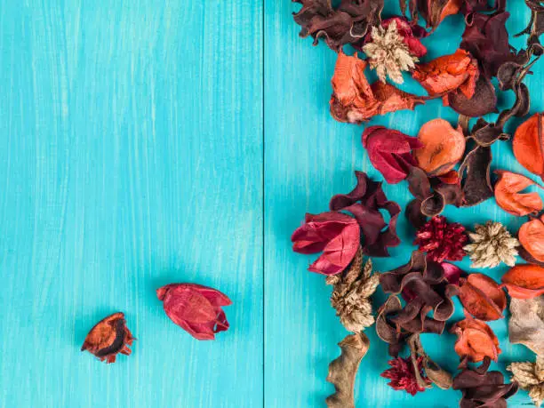 Dried Flowers Potpourri Scented Room Freshener on a Blue Background