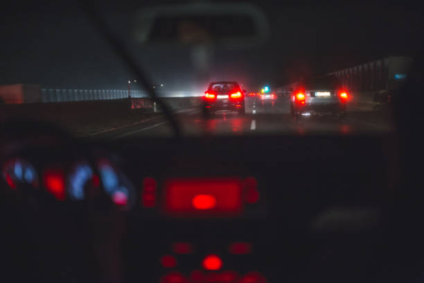 istock Driving on a highway on a rainy night 641984504
