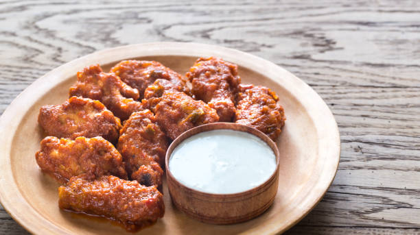 istock Fried chicken wings with blue cheese sauce 641985734
