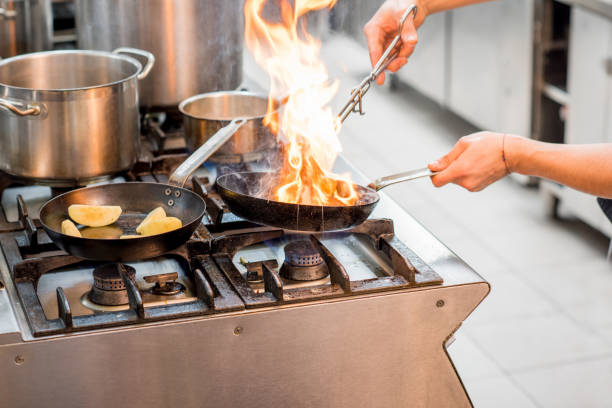 istock Cooking on the stove with fire 641988630