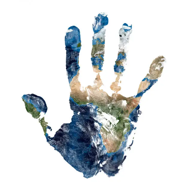 Photo of Real hand print combined with a map of Africa of blue planet Earth. Elements of this image furnished by NASA