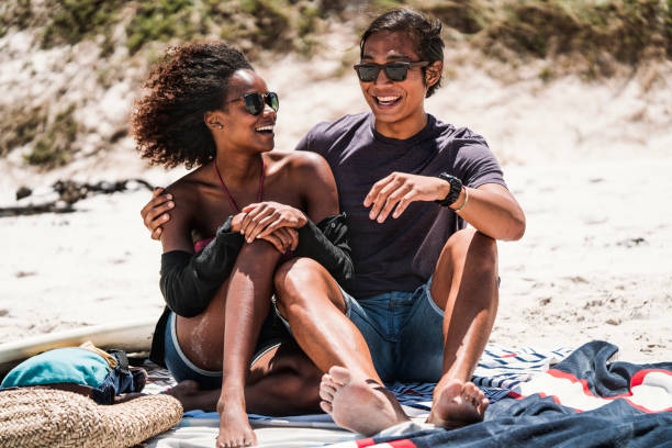 istock Loving young couple spending leisure time at beach 641994730