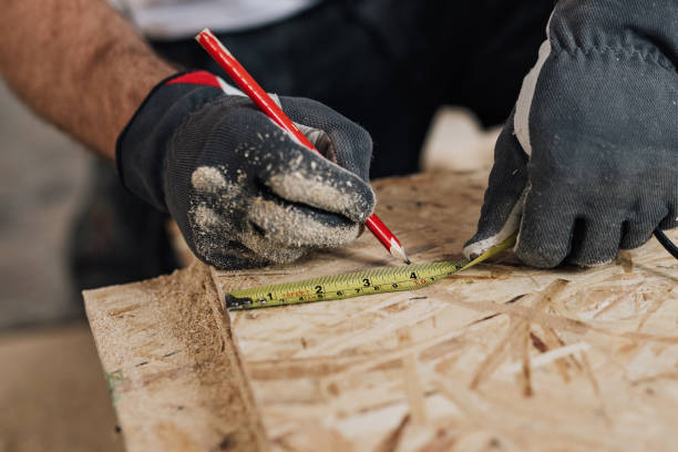 istock Man measuring when renovating his house 641994738