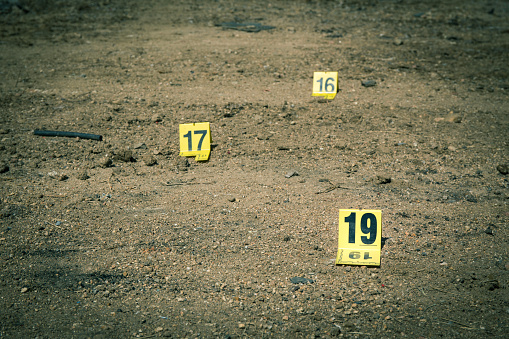 group of evidence marker number in crime scene investigation in cinematic tone