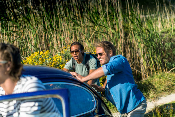 Friends surfers have fun at road trip back from beach
