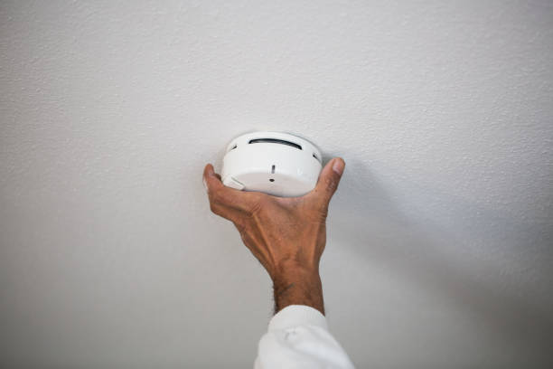 istock Installation of a smoke detector 641999282