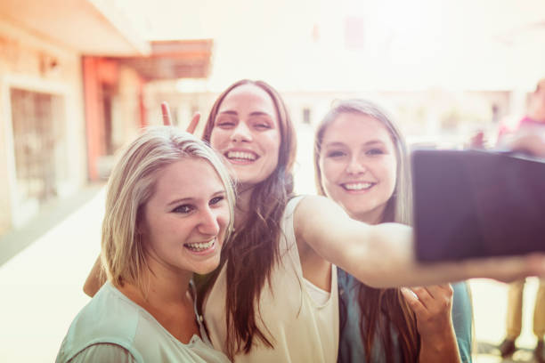 istock Female workers taking selfie outside brewery 641999376