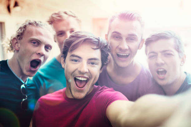 istock Happy male workers enjoying outside brewery 641999392