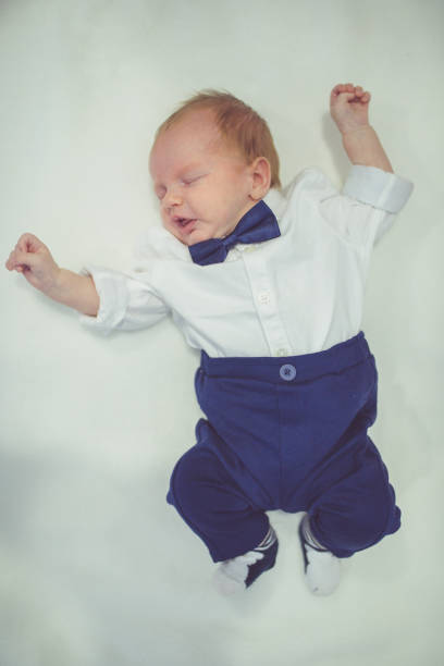istock Little newborn baby boy sleeps 642008410