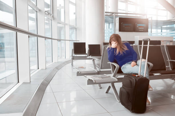 istock tired of waiting inside airport lounge 642011198
