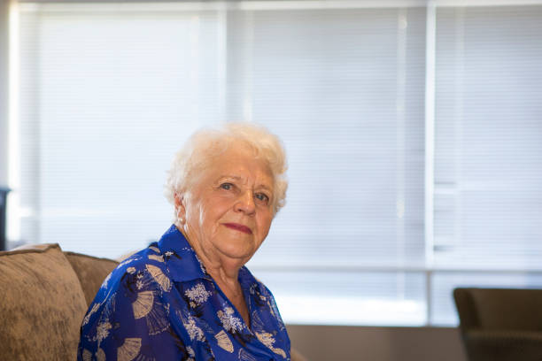 istock Senior woman looks up 642011962