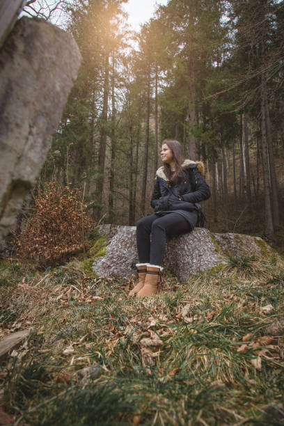 istock Female wanderlust in woodland 642014262